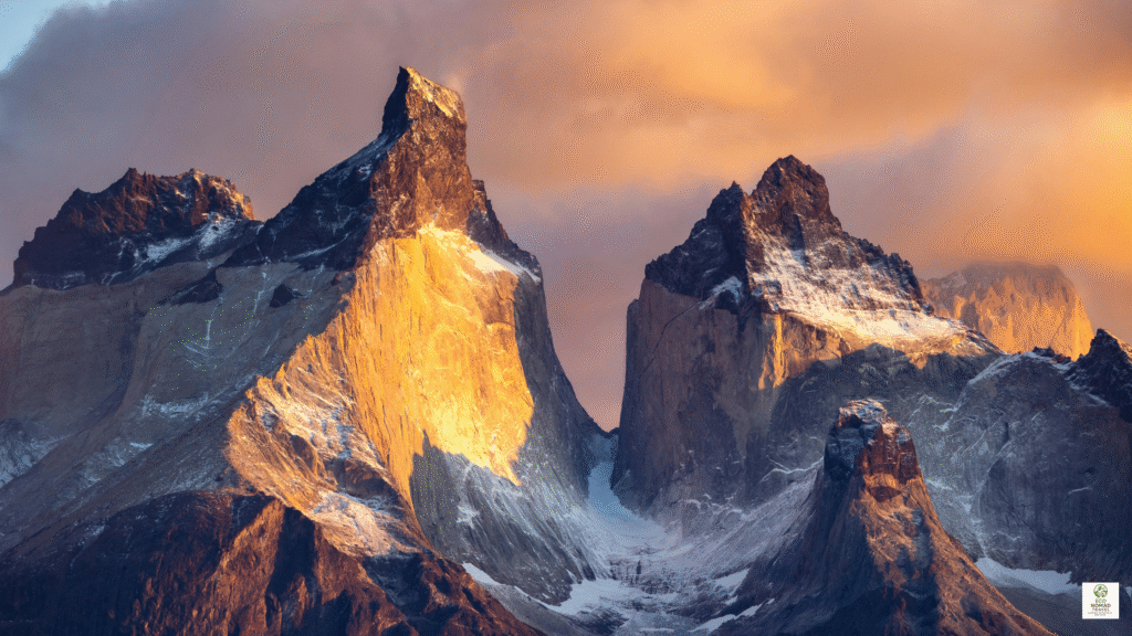 Eco-friendly off-grid eco camp domes in the Patagonia mountains at sunset, ideal for eco nomad lodging in 2025.
